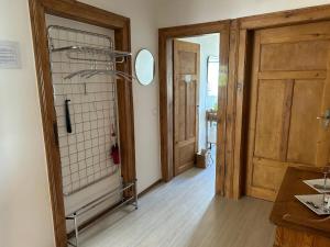 an empty room with a door and a room with a door at Ferienwohnung Anke Kaufmann in Miltenberg +3 photos