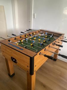 a large wooden billiard table with at Wohnung nah der Weser Monteurenwohnung Ferienwohnung in Hoya