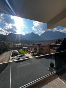 a view of the mountains from the balcony of a house at Hotel Restaurant Splendor in Buşteni +107 photos