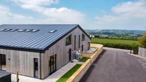 an image of a house with a metal roof at Bears Court in Cheltenham
