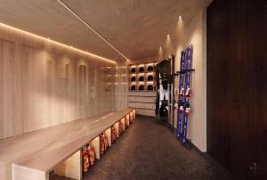 a room with a aisle with a bunch of products at THE OneThird HAKUBA Slopefront Villas in Hakuba