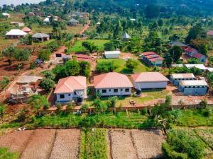 an aerial view of a small village with houses at Gejja Cottage in Lwanga