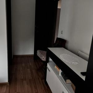 a black and white kitchen with a counter and a drawer at Casa Isabela in Ocna Sibiului +65 photos