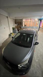 a black car parked in a garage at Moon Palace by MZ Hotels Pakistan KPK in Mingāora