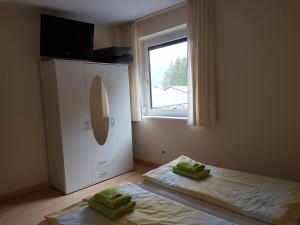 Postel nebo postele na pokoji v ubytování Ferienwohnung Pichlarn