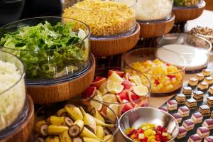 a table topped with bowls of different types of food at HOTEL MYSTAYS Nagoya Sakae -Renewed in September 2026 All Guest Rooms & Breakfast in Nagoya