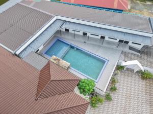 an overhead view of a swimming pool on a house at Chalet Gunung Stong in Dabung