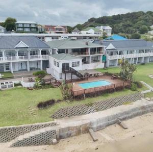 an aerial view of a house with a swimming pool at Unit 18 Kei Sands Resort in Kei-mouth Village
