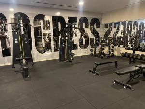 a gym with several rows of exercise bikes and weights at Safa Sorgun Thermal Hotel Wellness & SPA in Sorgun