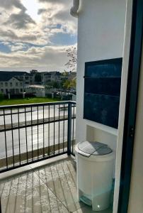 a balcony with a view of a body of water at Ocean view in Johannesburg
