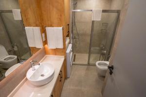 a bathroom with a sink and a shower and a toilet at Letstay Marine Homes in Antalya +27 photos