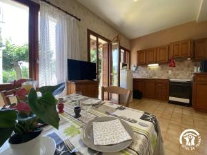 a kitchen with a table with a plate on it at Ribelles in Eus
