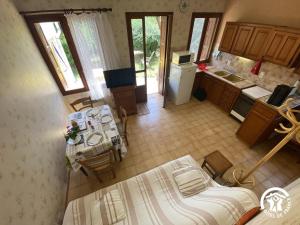 an overhead view of a kitchen with a bed and a table at Ribelles in Eus
