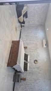 an overhead view of a bedroom with a bed and a floor at Villa Madiba in Somone