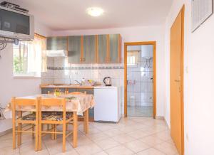 Kuchyň nebo kuchyňský kout v ubytování Apartments Cvita Sučić
