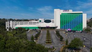 a large building with a parking lot in front of it at Harrah's Council Bluffs Hotel & Casino - A Caesars Rewards Destination in Council Bluffs +17 photos