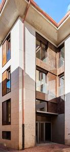 an office building with a large window at My Way Catedral in León