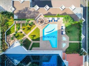 an overhead view of a pool at a resort at Novotel Bangkok Bangna in Bangna