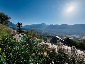 a view of a valley with mountains in the distance at Residence Pranterhof in Marlengo +60 photos