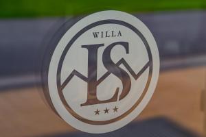 a close up of a sign with the name willka tfc at Willa Litworowy Staw in Bukowina Tatrzańska