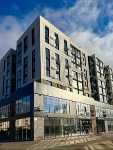 a large building with a lot of windows at Lutsk Elegance Apartment in Lutsk