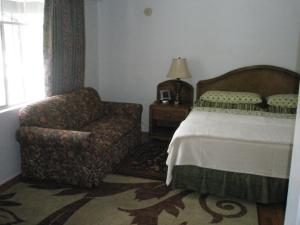 Postel nebo postele na pokoji v ubytování Mel Haven Motel