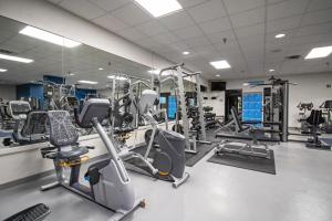 a gym with lots of treadmills and machines at Massanutten's Regal Vistas by TripForth in McGaheysville