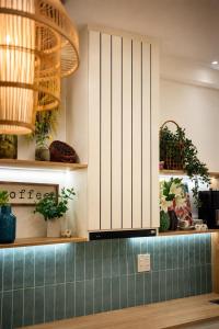 a kitchen with a counter with plants on it at Sea View Apartment Muong Thanh Oceanus Nha Trang in Nha Trang +153 photos