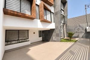 an external view of a building at Apart Hotel Regata Iquique in Iquique