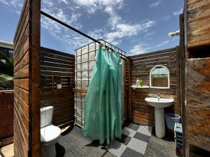 a bathroom with a toilet and a sink at Villa malaka in Dakar +37 photos