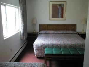Postel nebo postele na pokoji v ubytování Mel Haven Motel