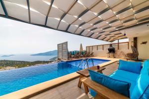 a villa with a pool and a view at Villa Panorama Kalkan Jilda Livya in Kalkan