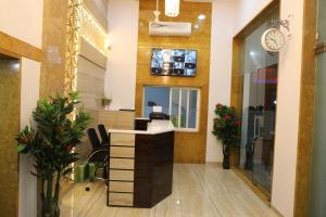 TV a/nebo společenská místnost v ubytování Hotel Pearl