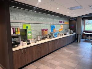 a cashier counter in a grocery store with at Tru By Hilton Bellefonte in Bellefonte