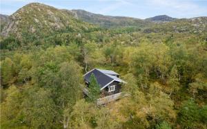 an old house in the middle of a mountain at Åstin in Dirdal