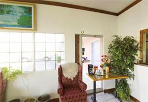 Χώρος καθιστικού στο Executive Inn Muldrow