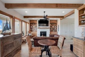 a living room with a couch and a fireplace at Itll Do in Padre Island