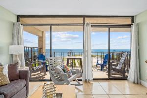 a living room with a view of the ocean at Laguna Reef #308 - Beautiful Bay View in Rockport