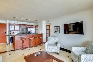 a living room with a couch and a table at San Luis 935-Luis Lookout in Galveston