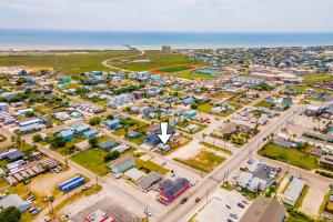 an aerial view of a city with a parking lot at P Alister Trio in Port Aransas