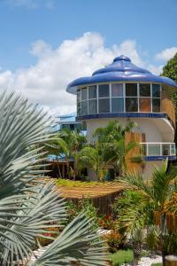a building with a blue dome on top of it at Mansao in Maragogi