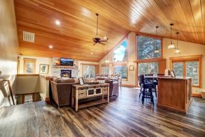 a living room with a couch and a table at On Tahoe Time - Pets Pool Table Game Room in South Lake Tahoe