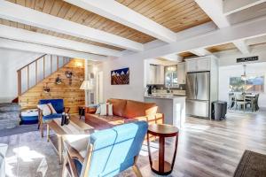 a living room with a couch and a table at Panorama Chalet in Nebelhorn