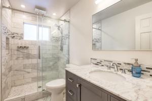 a bathroom with a toilet and a sink and a shower at Panorama Chalet in Nebelhorn +39 photos