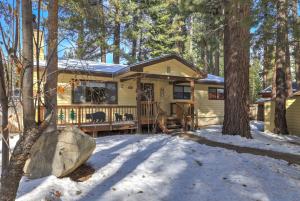 a house in the woods in the snow at Bear Claw Trails in Lake Tahoe Airport
