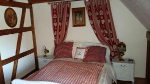 Postel nebo postele na pokoji v ubytování Chambre d'Hôtes "Au Vigneron"