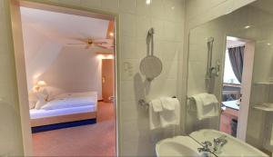 Koupelna v ubytování Hotel Augsburger Hof