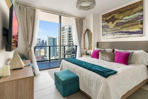 a bedroom with a large bed and a large window at Miami Luxe Sky 27 Skyline View Stunning Water & City Lights View, Resort Pool,Gym,Spa Restaurants in Miami