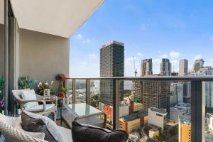 a balcony with a view of a city skyline at Miami Luxe Sky 27 Skyline View Stunning Water & City Lights View, Resort Pool,Gym,Spa Restaurants in Miami