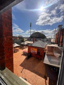 a view of a patio from a window of a building at The Leopold Hotel in Ararat